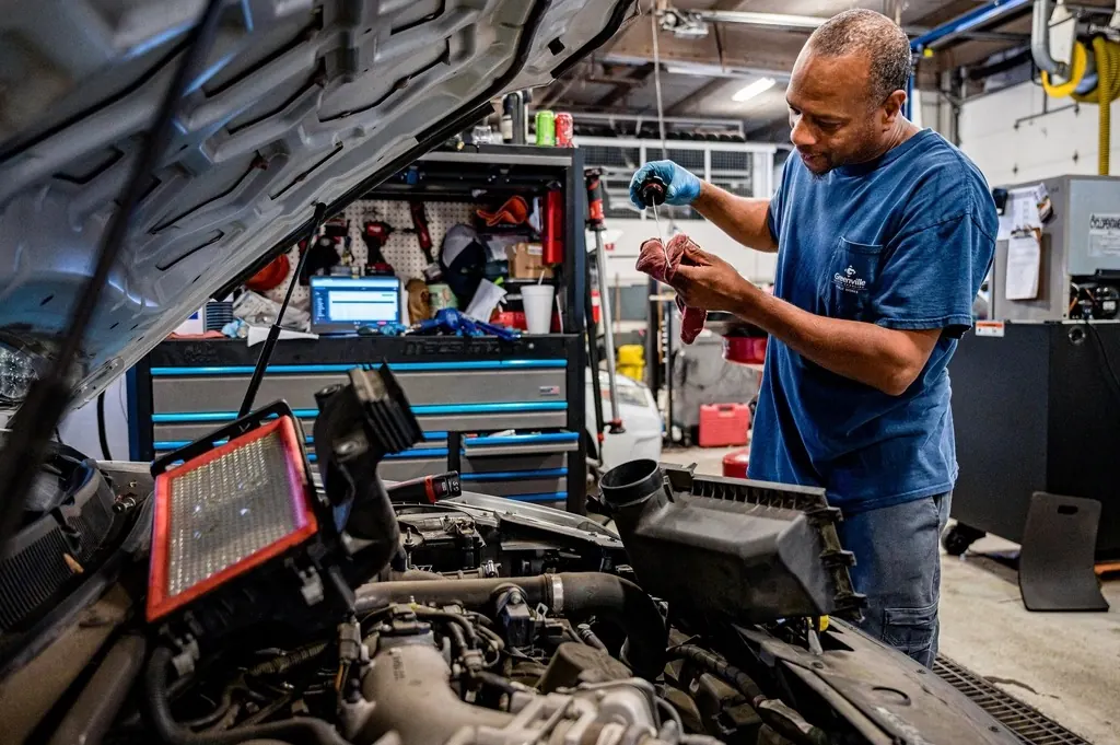 Mechanic checking a vehicle in the workshop